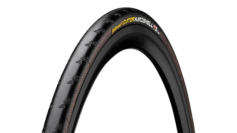 45-degree angle of Continental Gator Hardshell clincher bike tire mounted to rim showing sidewall and tread pattern