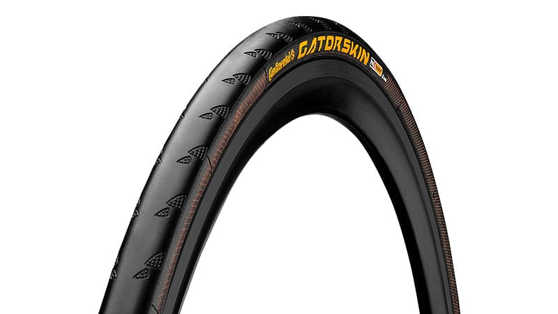 45-degree angle of Continental Gatorskin clincher bike tire mounted to rim showing sidewall and tread pattern