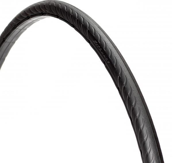 45-degree angle black Tannus New Slick foam airless tire attached to rim